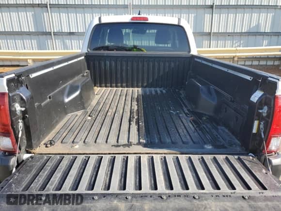 2023 Toyota Tacoma SR z VIN 3TYRX5GN0PT077478, wystawiony jako Copart lot #71023255 z przebiegiem 14 821 mil mil oraz Szkoda całkowita • Salvage title. Historia ofert i sprzedaży dostępna na DreamBid. Obrazek 10.