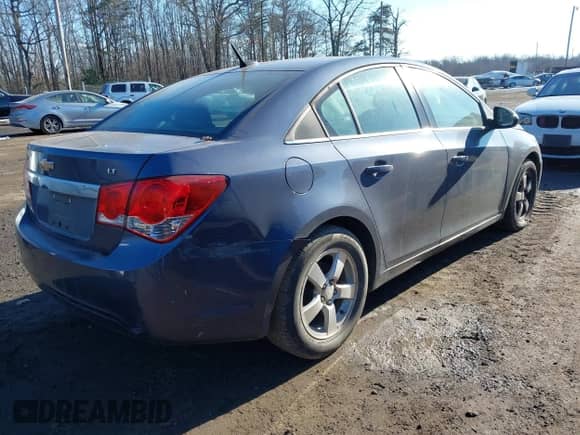 2013 Chevrolet Cruze 1LT with VIN 1G1PD5SB1D7328161, listed as a IAAI auction lot 41360894 with 189,868 mi miles and . Bid and sale history available at DreamBid. Image 4.
