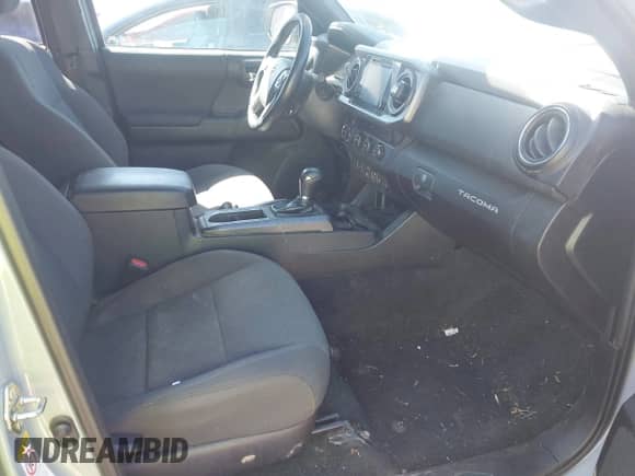 2019 Toyota Tacoma TRD Off Road z VIN 3TMCZ5AN2KM207371, wystawiony jako IAAI lot #43130878 z przebiegiem 104 178 mil mil oraz . Historia ofert i sprzedaży dostępna na DreamBid. Obrazek 5.