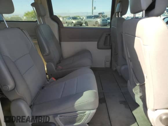 2010 Dodge Grand Caravan SE с VIN 2D4RN4DE0AR477415, выставлен на аукционе Copart как лот 81726555 с пробегом 120 607 миль миль и Списание • Salvage title. История ставок и продаж доступна на DreamBid. Изображение 10.