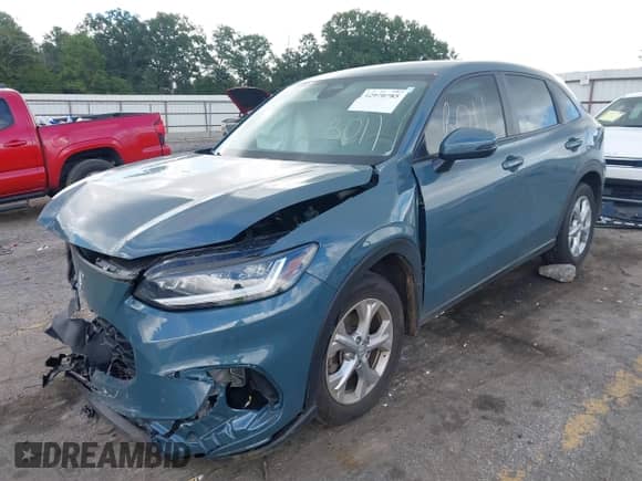 2025 Honda HR-V LX with VIN 3CZRZ1H36SM711648, listed as a IAAI auction lot 42970785 with 19,437 mi miles and . Bid and sale history available at DreamBid. Image 2.