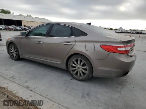 2013 Hyundai Azera с VIN KMHFH4JG6DA231521, выставлен на аукционе Copart как лот 50327805 с пробегом 176 041 миль миль и Списание • Salvage title. История ставок и продаж доступна на DreamBid. Изображение 2.