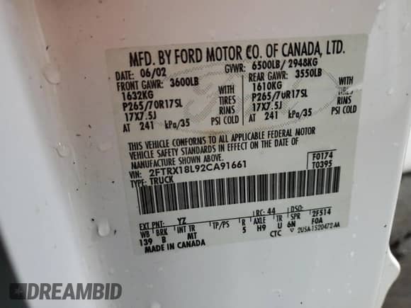 2002 Ford F-150 XL with VIN 2FTRX18L92CA91661, listed as a Copart auction lot 82144845 with Not provided miles and Salvage title. Bid and sale history available at DreamBid. Image 12.