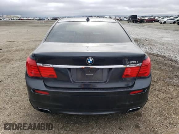 2011 BMW 7 Series 750i with VIN WBAKA8C5XBCY36778, listed as a Copart auction lot 86220094 with 95,536 mi miles and Salvage title. Bid and sale history available at DreamBid. Image 6.