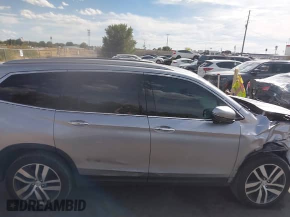 2016 Honda Pilot Touring z VIN 5FNYF6H94GB012204, wystawiony jako IAAI lot #43166328 z przebiegiem 108 897 mil mil oraz . Historia ofert i sprzedaży dostępna na DreamBid. Obrazek 13.