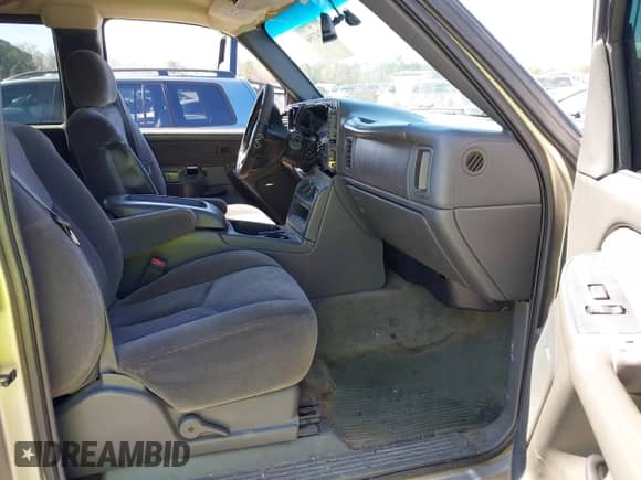 2003 GMC Sierra 1500 SLT z VIN 1GTEK19TX3E107129, wystawiony jako IAAI lot #41747356 z przebiegiem 267 536 mil mil oraz . Historia ofert i sprzedaży dostępna na DreamBid. Obrazek 5.