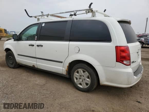 2011 Dodge Caravan with VIN 2D4JN1AG4BR722929, listed as a Copart auction lot 64454644 with 250,240 mi miles and Salvage title. Bid and sale history available at DreamBid. Image 2.