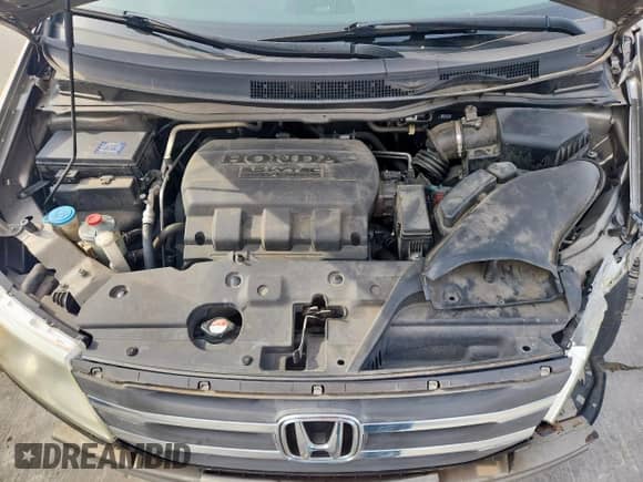 2012 Honda Odyssey LX z VIN 5FNRL5H2XCB078504, wystawiony jako Copart lot #71738495 z przebiegiem 155 321 mil mil oraz Szkoda całkowita • Salvage title. Historia ofert i sprzedaży dostępna na DreamBid. Obrazek 12.