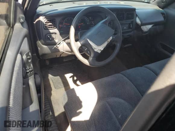 1999 Dodge Dakota SLT with VIN 1B7GL26Z9XS278840, listed as a Copart auction lot 65640885 with 62,454 mi miles and Salvage title. Bid and sale history available at DreamBid. Image 8.