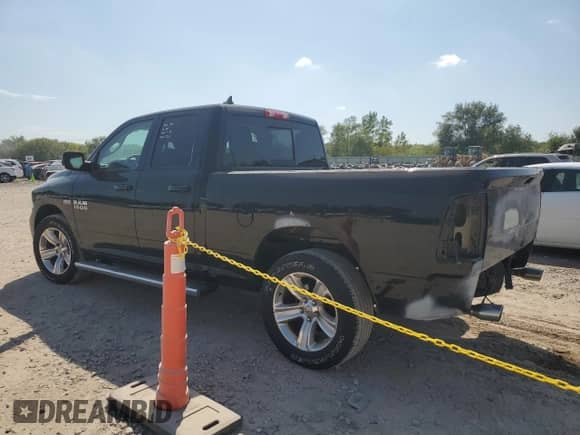 2014 Ram 1500 Sport with VIN 1C6RR7HT6ES145650, listed as a Copart auction lot 69302434 with 116,732 mi miles and Salvage title. Bid and sale history available at DreamBid. Image 2.