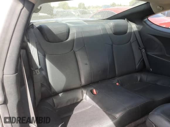 2011 Hyundai Genesis Coupe Track z VIN KMHHU6KH7BU061074, wystawiony jako Copart lot #70147024 z przebiegiem 121 711 mil mil oraz Szkoda całkowita • Salvage title. Historia ofert i sprzedaży dostępna na DreamBid. Obrazek 10.