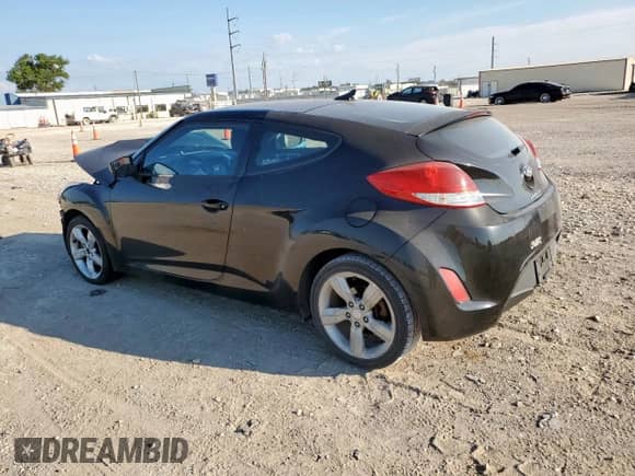 2015 Hyundai Veloster z VIN KMHTC6AD4FU245065, wystawiony jako Copart lot #68655815 z przebiegiem 120 922 mil mil oraz Szkoda całkowita • Salvage title. Historia ofert i sprzedaży dostępna na DreamBid. Obrazek 2.