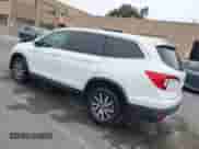 2020 Honda Pilot EX-L с VIN 5FNYF6H59LB059154, выставлен на аукционе IAAI как лот 42584799 с пробегом 56 532 миль миль и . История ставок и продаж доступна на DreamBid. Изображение 3.