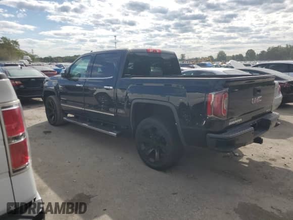 2018 GMC Sierra 1500 Denali with VIN 3GTU2PECXJG521358, listed as a Copart auction lot 70265395 with 99,289 mi miles and Salvage title. Bid and sale history available at DreamBid. Image 2.