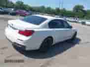 2013 BMW 7 Series 750Li xDrive with VIN WBAYF8C51DD139735, listed as a IAAI auction lot 42590928 with 118,984 mi miles and . Bid and sale history available at DreamBid. Image 4.