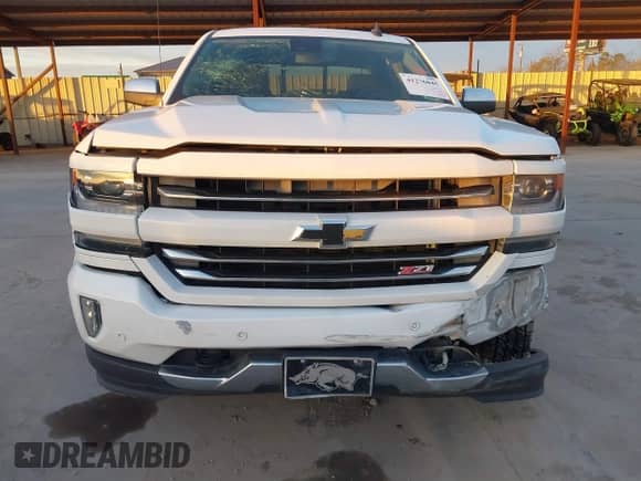 2016 Chevrolet Silverado 1500 LTZ z VIN 3GCUKSEJ0GG221628, wystawiony jako IAAI lot #41276045 z przebiegiem 153 476 mil mil oraz . Historia ofert i sprzedaży dostępna na DreamBid. Obrazek 13.