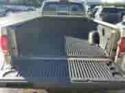 2002 Dodge Dakota z VIN 1B7FL16XX2S702359, wystawiony jako Copart lot #43026735 z przebiegiem 103 633 mil mil oraz Szkoda całkowita • Salvage title. Historia ofert i sprzedaży dostępna na DreamBid. Obrazek 10.