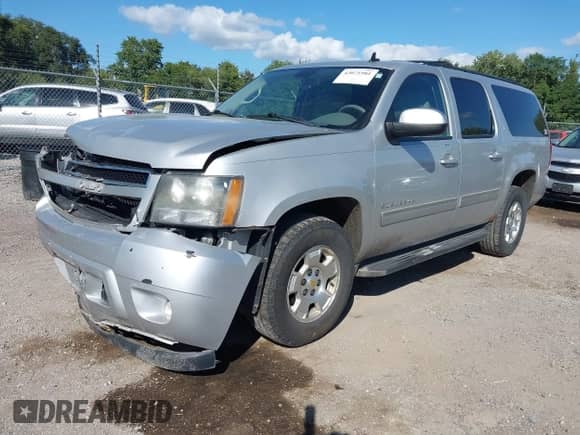 2011 Chevrolet Suburban LT with VIN 1GNSKJE31BR112484, listed as a IAAI auction lot 43071981 with 235,471 mi miles and . Bid and sale history available at DreamBid. Image 2.