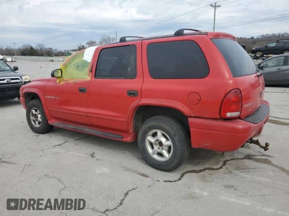 2000 Dodge Durango with VIN 1B4HS28ZXYF169704, listed as a Copart auction lot 62874865 with 258,984 mi miles and Salvage title. Bid and sale history available at DreamBid. Image 2.