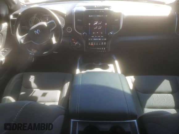 2024 Ram 1500 Big Horn with VIN 1C6SRFBT0RN210968, listed as a Copart auction lot 49988365 with 7,678 mi miles and Salvage title. Bid and sale history available at DreamBid. Image 8.