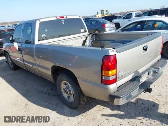 2003 GMC Sierra 1500 SLE with VIN 2GTEC19T431339076, listed as a IAAI auction lot 41097455 with 164,517 mi miles and . Bid and sale history available at DreamBid. Image 3.