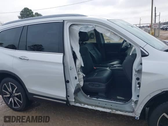 2022 Honda Pilot Touring 8-Passenger with VIN 5FNYF5H99NB001383, listed as a IAAI auction lot 41389422 with 56,055 mi miles and . Bid and sale history available at DreamBid. Image 14.