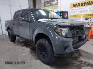 2013 Nissan Frontier SV with VIN 1N6AD0EV5DN734619, listed as a IAAI auction lot 41300993 with 104,013 mi miles and . Bid and sale history available at DreamBid. Image 1.