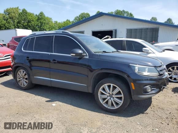 2014 Volkswagen Tiguan SE with VIN WVGBV3AX8EW532247, listed as a Copart auction lot 66505205 with 172,786 mi miles and Clean title. Bid and sale history available at DreamBid. Image 4.