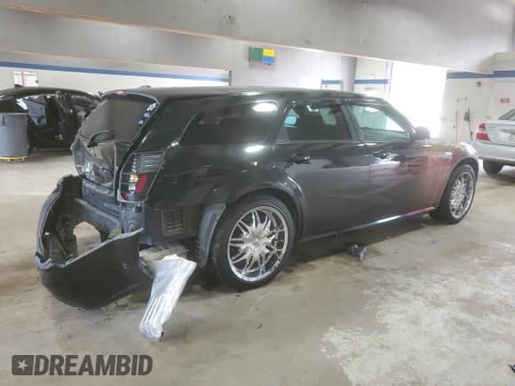 2005 Dodge Magnum SE with VIN 2D4FV48T25H161344, listed as a Copart auction lot 68303715 with 95,064 mi miles and Salvage title. Bid and sale history available at DreamBid. Image 3.