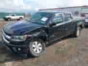 2016 Chevrolet Colorado 4WD WT z VIN 1GCGTBE30G1379817, wystawiony jako IAAI lot #43284954 z przebiegiem 88 749 mil mil oraz . Historia ofert i sprzedaży dostępna na DreamBid. Obrazek 2.