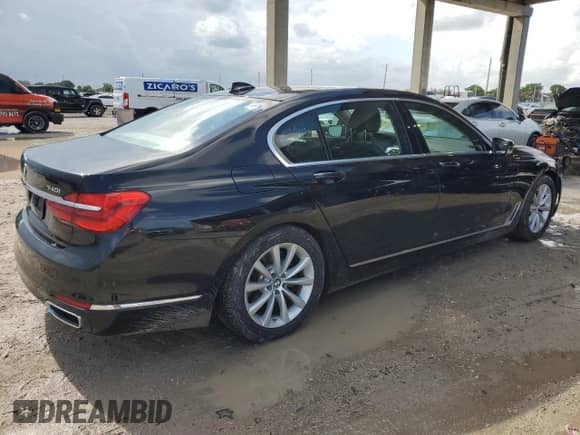 2018 BMW 7 Series 740i with VIN WBA7E2C5XJG742432, listed as a Copart auction lot 70258945 with 65,223 mi miles and Salvage title. Bid and sale history available at DreamBid. Image 3.