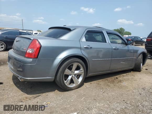 2006 Chrysler 300 C SRT-8 z VIN 2C3LA73W86H473608, wystawiony jako Copart lot #64892974 z przebiegiem Nie podano mil oraz Szkoda całkowita • Salvage title. Historia ofert i sprzedaży dostępna na DreamBid. Obrazek 3.
