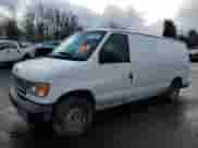 2001 Ford Econoline Cargo with VIN 1FTRE14251HA20435, listed as a Copart auction lot 44000085 with 69,015 mi miles and Salvage title. Bid and sale history available at DreamBid. Image 1.