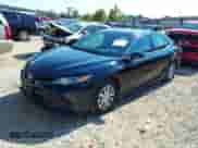 2020 Toyota Camry Hybrid LE with VIN 4T1E31AK9LU019478, listed as a IAAI auction lot 43097201 with 48,313 mi miles and . Bid and sale history available at DreamBid. Image 2.