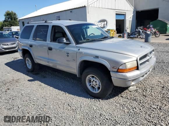1999 Dodge Durango with VIN 1B4HS28Y3XF543947, listed as a Copart auction lot 71211375 with Not provided miles and Salvage title. Bid and sale history available at DreamBid. Image 4.