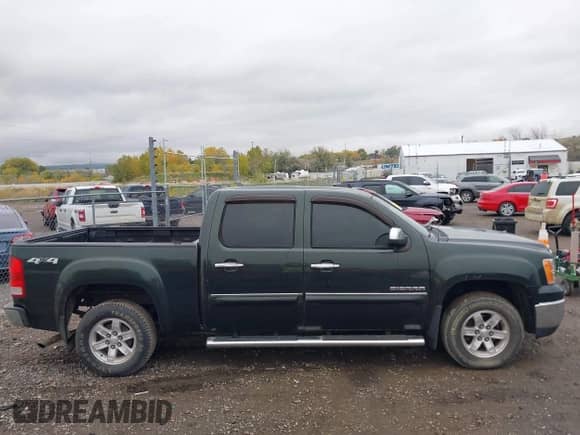 2013 GMC Sierra 1500 SLE z VIN 3GTP2VE75DG231117, wystawiony jako IAAI lot #43475156 z przebiegiem 99 209 mil mil oraz . Historia ofert i sprzedaży dostępna na DreamBid. Obrazek 13.