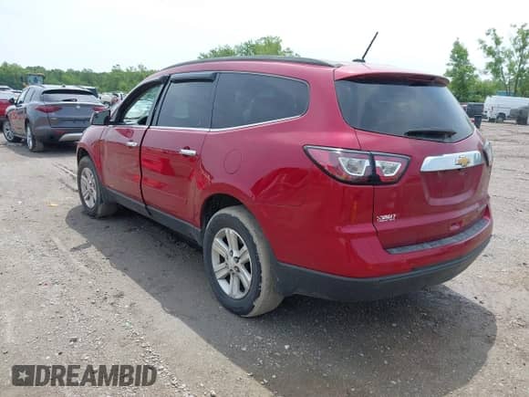 2014 Chevrolet Traverse LT z VIN 1GNKRHKD4EJ160615, wystawiony jako IAAI lot #42534498 z przebiegiem 123 495 mil mil oraz . Historia ofert i sprzedaży dostępna na DreamBid. Obrazek 3.