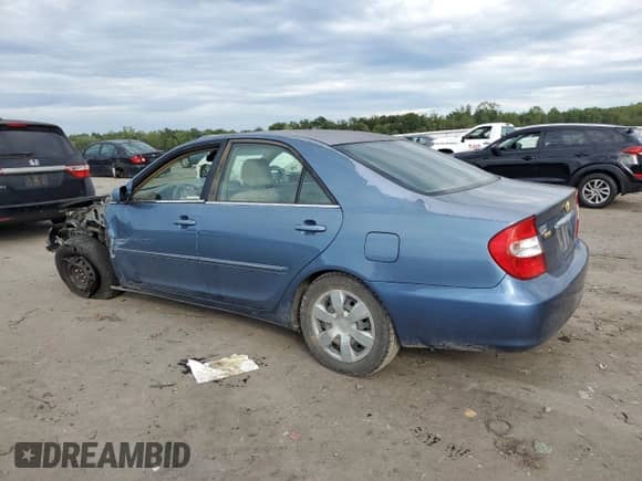 2003 Toyota Camry XLE с VIN 4T1BE30K23U692025, выставлен на аукционе Copart как лот 84215745 с пробегом 149 774 миль миль и Списание • Salvage title. История ставок и продаж доступна на DreamBid. Изображение 2.