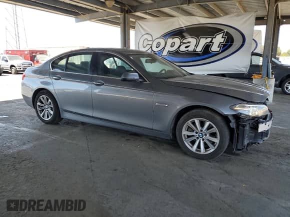 2015 BMW 5 Series 528i with VIN WBA5A5C58FD521358, listed as a Copart auction lot 69699825 with 78,449 mi miles and Salvage title. Bid and sale history available at DreamBid. Image 4.