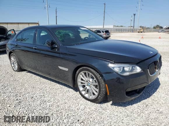 2013 BMW 7 Series 750Li xDrive с VIN WBAYF8C50DD140715, выставлен на аукционе Copart как лот 80479335 с пробегом 106 285 миль миль и Списание • Salvage title. История ставок и продаж доступна на DreamBid. Изображение 4.