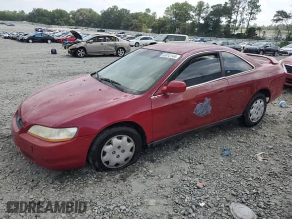 2000 Honda Accord LX z VIN 1HGCG3241YA010313, wystawiony jako Copart lot #66912144 z przebiegiem 178 575 mil mil oraz Szkoda całkowita • Salvage title. Historia ofert i sprzedaży dostępna na DreamBid. Obrazek 1.