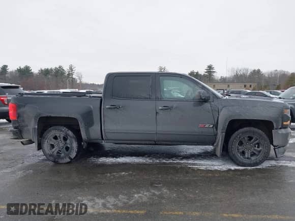 2016 Chevrolet Silverado 1500 LTZ with VIN 3GCUKSEC7GG377750, listed as a IAAI auction lot 41266073 with 184,720 mi miles and . Bid and sale history available at DreamBid. Image 13.