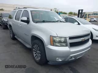2010 Chevrolet Suburban LT z VIN 1GNUCJE03AR238548, wystawiony jako IAAI lot #42104596 z przebiegiem 153 959 mil mil oraz . Historia ofert i sprzedaży dostępna na DreamBid. Obrazek 1.