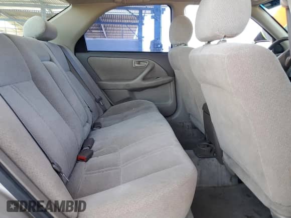 2001 Toyota Camry LE z VIN 4T1BF22K11U120459, wystawiony jako Copart lot #57449755 z przebiegiem 163 723 mil mil oraz Szkoda całkowita • Salvage title. Historia ofert i sprzedaży dostępna na DreamBid. Obrazek 10.