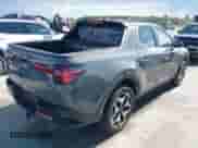 2024 Hyundai Santa Cruz Limited with VIN 5NTJEDDF6RH122391, listed as a IAAI auction lot 42391289 with 14,876 mi miles and . Bid and sale history available at DreamBid. Image 4.