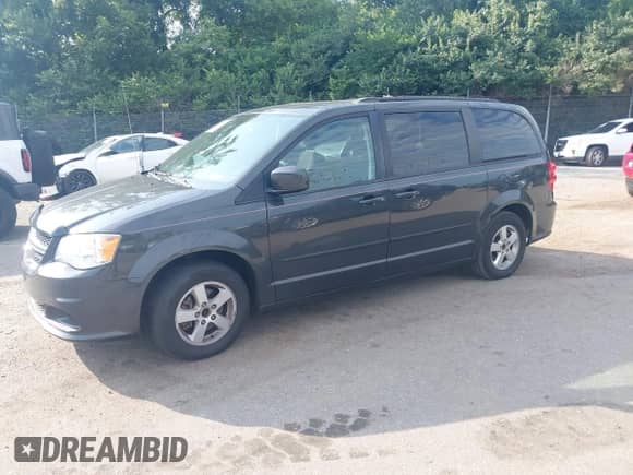 2012 Dodge Grand Caravan SXT with VIN 2C4RDGCG5CR294986, listed as a IAAI auction lot 42804374 with 183,596 mi miles and . Bid and sale history available at DreamBid. Image 18.