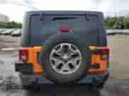 2013 Jeep Wrangler Rubicon 10th Anniversary with VIN 1C4BJWCG0DL509141, listed as a Copart auction lot 70674925 with 118,224 mi miles and Salvage title. Bid and sale history available at DreamBid. Image 6.