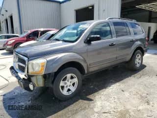 2004 Dodge Durango SLT with VIN 1D4HD48NX4F167468, listed as a Copart auction lot 56665595 with 275,747 mi miles and Salvage title. Bid and sale history available at DreamBid. Image 1.