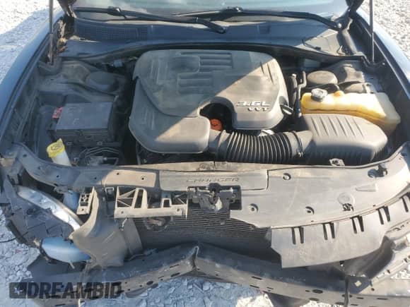 2015 Dodge Charger SXT with VIN 2C3CDXHG5FH825519, listed as a Copart auction lot 71492375 with 202,050 mi miles and Salvage title. Bid and sale history available at DreamBid. Image 11.