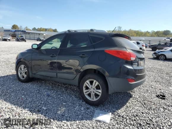2012 Hyundai Tucson GLS with VIN KM8JU3AC0CU496915, listed as a Copart auction lot 82651635 with 220,566 mi miles and Salvage title. Bid and sale history available at DreamBid. Image 2.